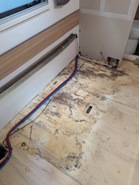 Damp Floor About to Be Replaced In Bailey Under Warranty
